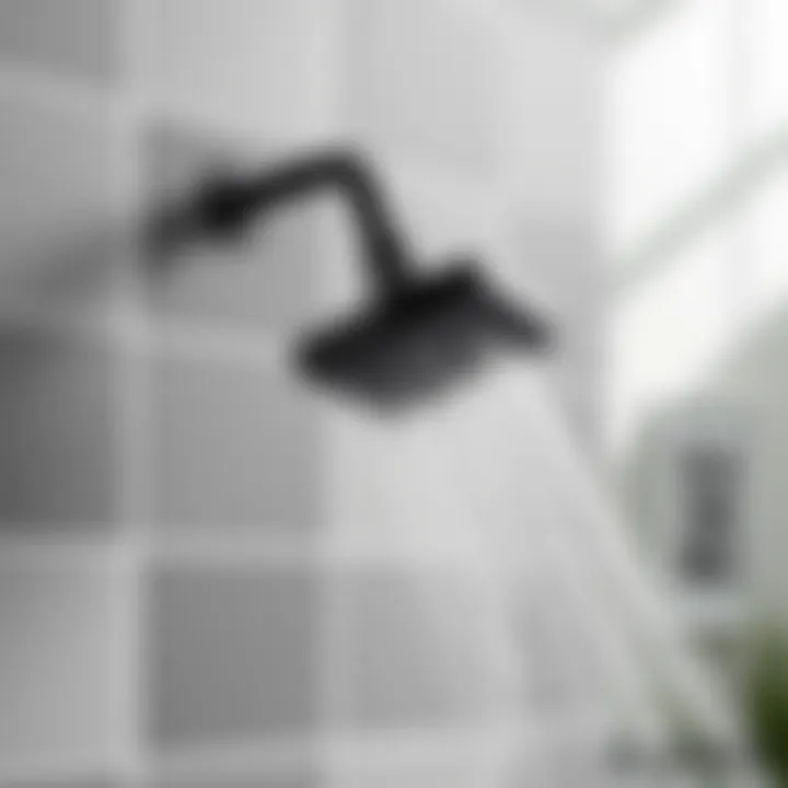 Sleek black chrome shower head against a modern tiled wall